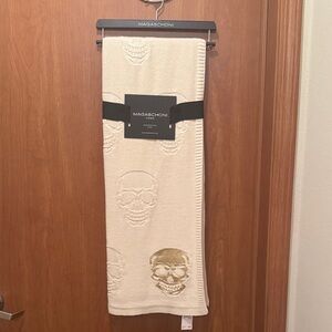 Magaschoni Ivory and Gold Skull throw blanket